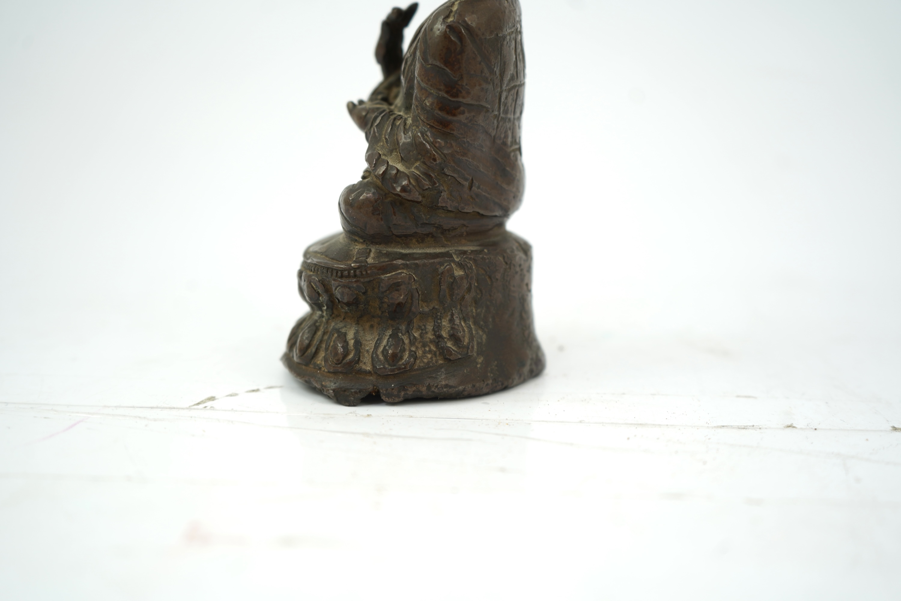 A Nepalese copper alloy figure of Vairocana, 19th century or later